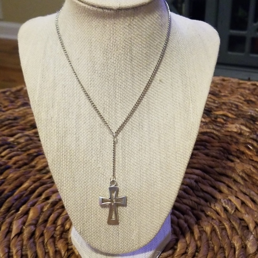 Silver plated necklace with drop cross charm.